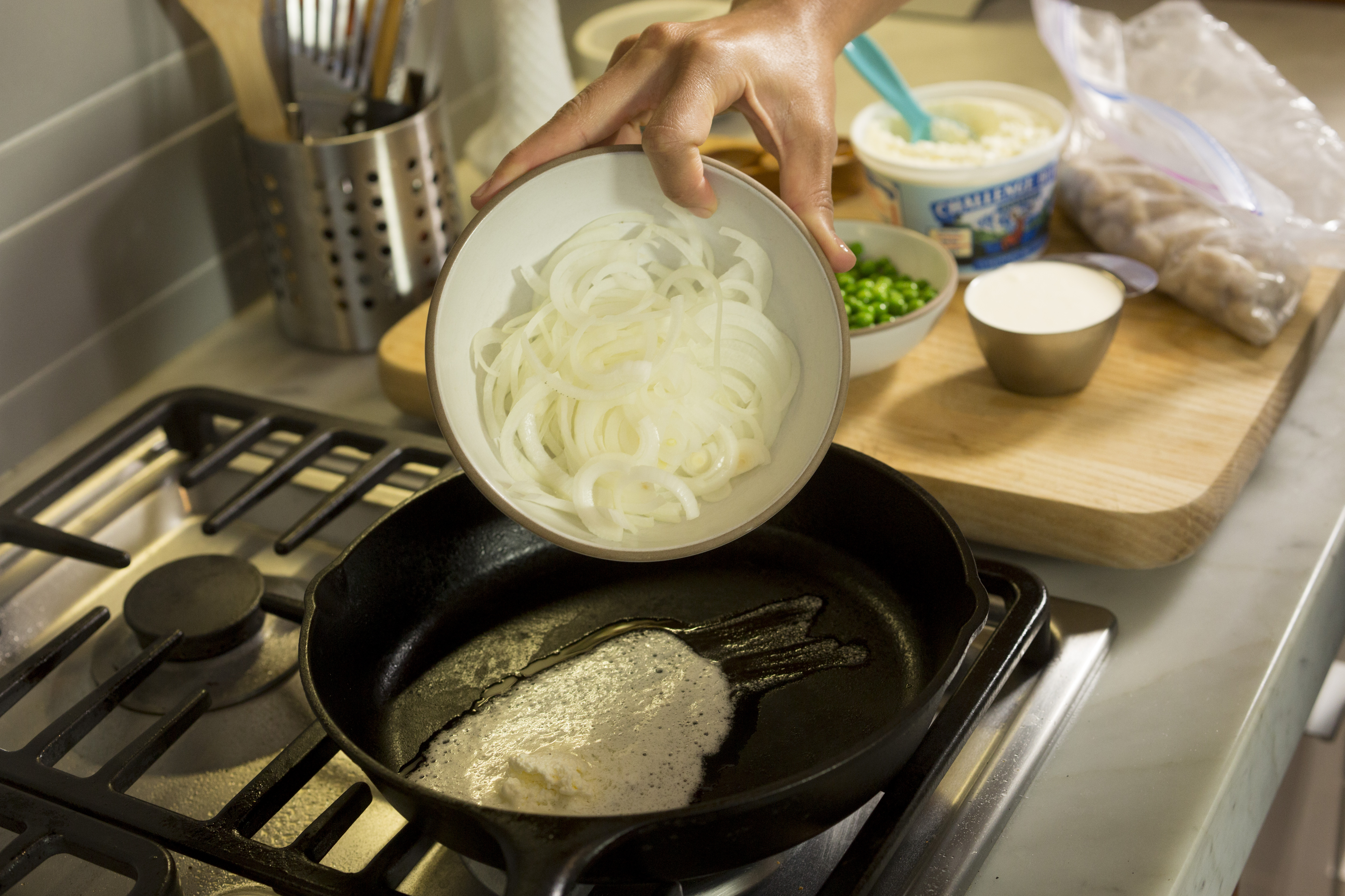 Sous Vide Gnocchi Pillows with Caramelized Onion, Peas, Parmesan, and Cream